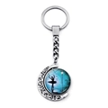 Close-up of rotating ballerina moon keychain with blue artistic silhouette charm - Blue Night Scene Art Style (JY007575-10)