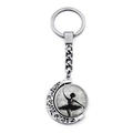 Detailed silver crescent moon keychain featuring a ballerina silhouette and musical notes - Musical Score Silhouette Art Style (JY007575-6)