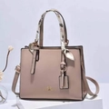 Elegant beige leather handbag with printed silk scarf wrap on handle and shoulder strap - Khaki