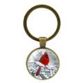 Macro view of cardinal bird glass cabochon pendant on bronze vintage keychain - HD Red Bird In Snow Style (XSWX4976-5)