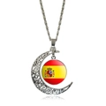 Detail of silver hollow moon pendant featuring a Spanish flag glass gem charm on a wave chain - Spain Style