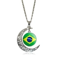 Silver hollow crescent moon necklace featuring a Brazil flag glass gem pendant - Brazil