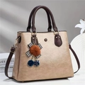 Minimalist large-capacity faux leather handbag in khaki with brown handles and plush charm - Khaki
