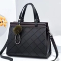 Classic black quilted tote bag with double handles and a green fur pompom charm - L28 H22 W15 / Black