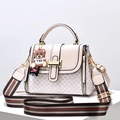 Pink crossbody square bag with DH monogram, golden handle and striped web shoulder strap - L23 H17 W12 / Off White