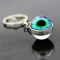 Double-sided glass evil eye keychain with blue-green iris on polished silver base - Cyan Blue Eye (JY007784-12)