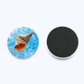 Macro view of 25mm round glass fridge magnet with seashell ocean pattern and magnetic back - Dark Blue Conch Style (JY007728-5)