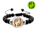 Detailed view of luminous zodiac beaded bracelet with koi motif and dark glow effect - Pisces