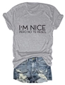Detailed flat lay of grey T-shirt with I'M NICE PERO NO TE PASES print and ripped denim shorts - Light Gray (Black Font)
