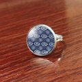 Detailed close-up of adjustable evil eye ring with blue glass patterns on vintage silver - Wavy Blue Eye (JY007909-6)