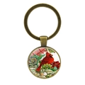 Détail macro du porte-clés oiseau cardinal avec cadre en bronze et dôme en verre - Style Cardinal avec Feuilles et Fleurs (JY007873-12)