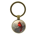 Détail du porte-clés oiseau cardinal avec finition bronze vintage et pendentif en verre - Style Illustration Réaliste Cardinal (JY007873-10)