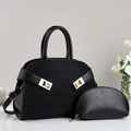 Chic black woven tote bag and pouch set with gold hardware on a minimalist background - Black