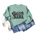 Flat lay of sage green Soccer NANA sweatshirt with ribbed cuffs and blue jeans - S / Light Green