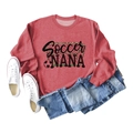 Flat lay of a red Soccer Nana crewneck sweatshirt with casual denim jeans and white sneakers - S / Red