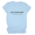 Detailed view of CAN'T THROW STONES print on a light blue cotton summer t-shirt - Light Blue (Black Font)