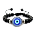 Détail de la breloque œil bleu sur bracelet en perles noires mates avec cordon - Style Bohème Bleu et Blanc (JY007914-5)