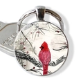 Silver cardinal bird keychain featuring winter art pendant and polished metal ring - Winter Pine Cardinal Illustration (JY007885-4)