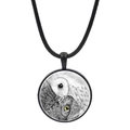 Macro detail of round glass owl pendant necklace with black woven rope and metal frame - Yellow Eye Owl Style (JY007933-23)