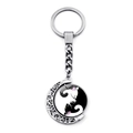 Detail of a rotating metal keychain featuring a crescent frame and cat yin yang pattern - Jy007930-24