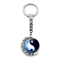 Close-up of rotatable Yin Yang Tai Chi pendant with crescent moon hollowed pattern - Jy007930-18