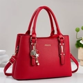 Elegant red litchi texture handbag with gold hardware and a detachable shoulder strap - Burgundy