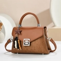 Elegant caramel brown corduroy handbag with metal buckle and star tassel charm - Earthy Yellow