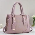 Elegant mauve leather handbag with woven texture detail and gold metal hardware - Pink Purple