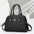 Elegant black herringbone textured shell bag with metal chain handles and shoulder strap - Black