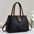 Borsa tote classica nera e marrone con trama vintage e dettagli metallici dorati - Nero
