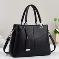Borsa a mano classica in pelle nera testurizzata con cuciture geometriche e dettagli argento - Nero