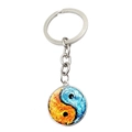 Detail of Yin Yang glass pendant keychain featuring fire and water element designs - Ice And Fire Fusion Yin Yang Style (JY007999-11)