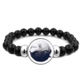 Macro detail of elastic beaded bracelet featuring black beads and dragon yin yang wolf charm - Circular Wolf Shadow Pattern (JY007992-6)