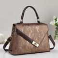 Elegant brown striped handbag with leather trim and gold buckle on a white display stand - Coffee