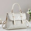 Detail of cream white tote bag with vertical texture and gold metal buckle hardware - Off White