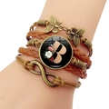 Vintage multilayer leather bracelet with bronze butterfly, infinity charm, and letter B - Letter B
