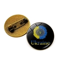 Vue détaillée de la broche tournesol avec face bleu-jaune et épingle en métal bronze - Style Texte Tournesol Emblème (JY008070-11)