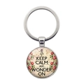 Detailed macro view of vintage Keep Calm and Wonder On round glass keychain pendant - Vintage Floral Wonder On Style (JY008095-12)