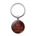 Detail of a round metal keychain with Keep Calm and Read On text and a golden crown - Red Brown Read On Style (JY008095-11)