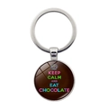 Detail of keychain featuring a chocolate slogan and cupcake icon on a round alloy pendant - Chocolate Cupcake Style (JY008095-9)