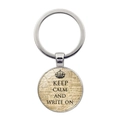 Macro detail of Keep Calm and Write On keychain pendant with vintage crown motif on white base - Retro Writing Quote Style (JY008095-6)