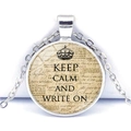 Macro shot of vintage silver-toned Keep Calm necklace with glass gem and crown detail - Crown Handwritten Letter Style (JY008111-6)