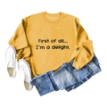 Detail of First of all letter print on mustard yellow crewneck sweatshirt with ribbed cuffs - S / Yellow Sweatshirt (Black Font)