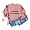 Flat lay of pink sweatshirt with First of all text styled with blue jeans and sneakers - S / Rose Gold Sweatshirt (Black Font)