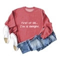 Flat lay of red crewneck sweatshirt with First of all text print and denim shorts - S / Red Sweatshirt (White Font)