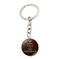 Dettaglio del portachiavi rotondo Keep Calm and Eat Chocolate con un cupcake - Stile Tema Cioccolato(JY008110-9)