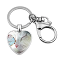 Detail of a heart-shaped silver keychain featuring a white cat and a blue butterfly - White Cat and Blue Butterfly(JY008169-9)