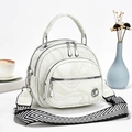 Elegant off-white marble pattern handbag with chevron strap and silver hardware accents - Off White