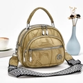 Detail of beige marble pattern handbag with multi-layer zippers and wide strap - Dark Khaki
