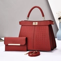 Detailed set of red lychee grain leather handbag with woven texture and metal twist lock - Burgundy